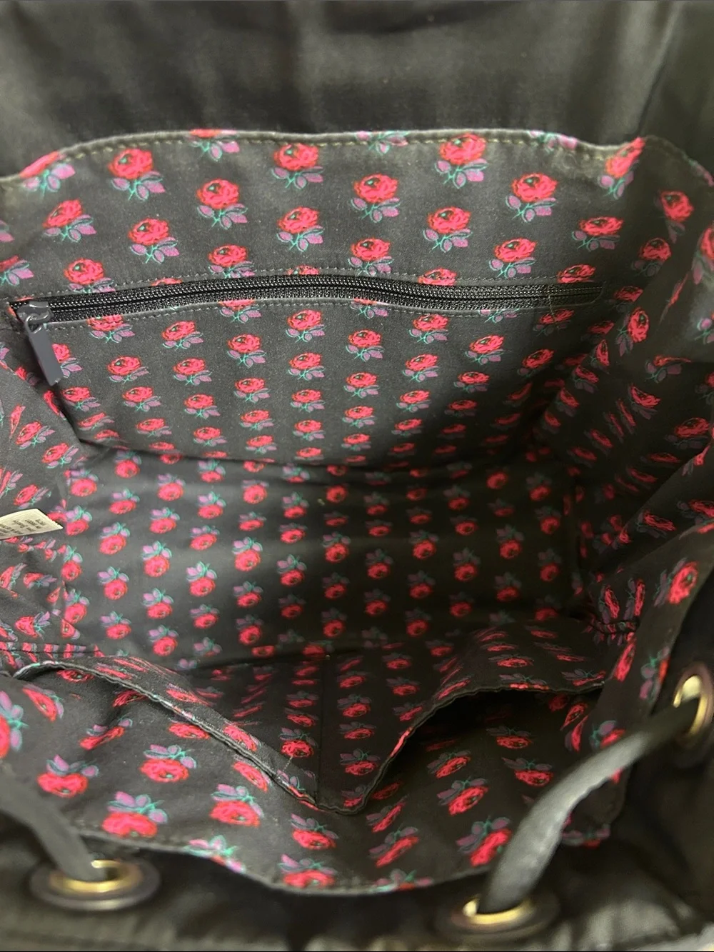 Vera Bradley quilted backpack in navy blue, diamond pattern a front flap closure